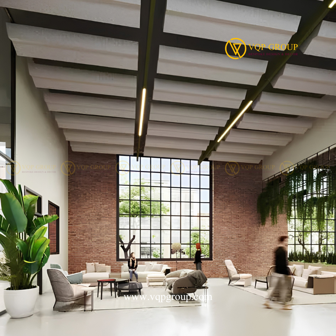 Hệ tấm tiêu âm PET Summit màu trắng gấp khối treo trên trần tối của không gian lounge trần cao